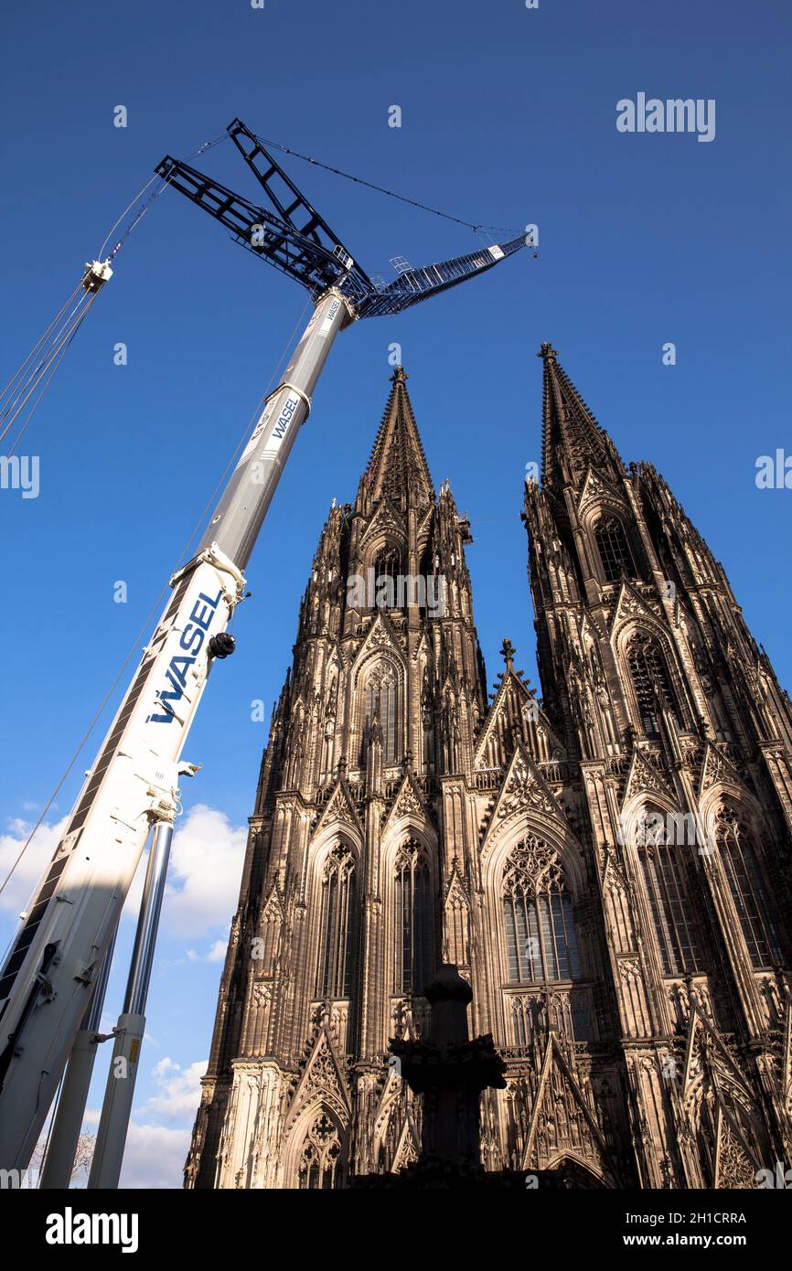 after the removing of a 30-meter-high scaffold, that hung for 10 years in 105 meters hight at the north tower of the cathedral, the 124 meter high cra Stock Photo
