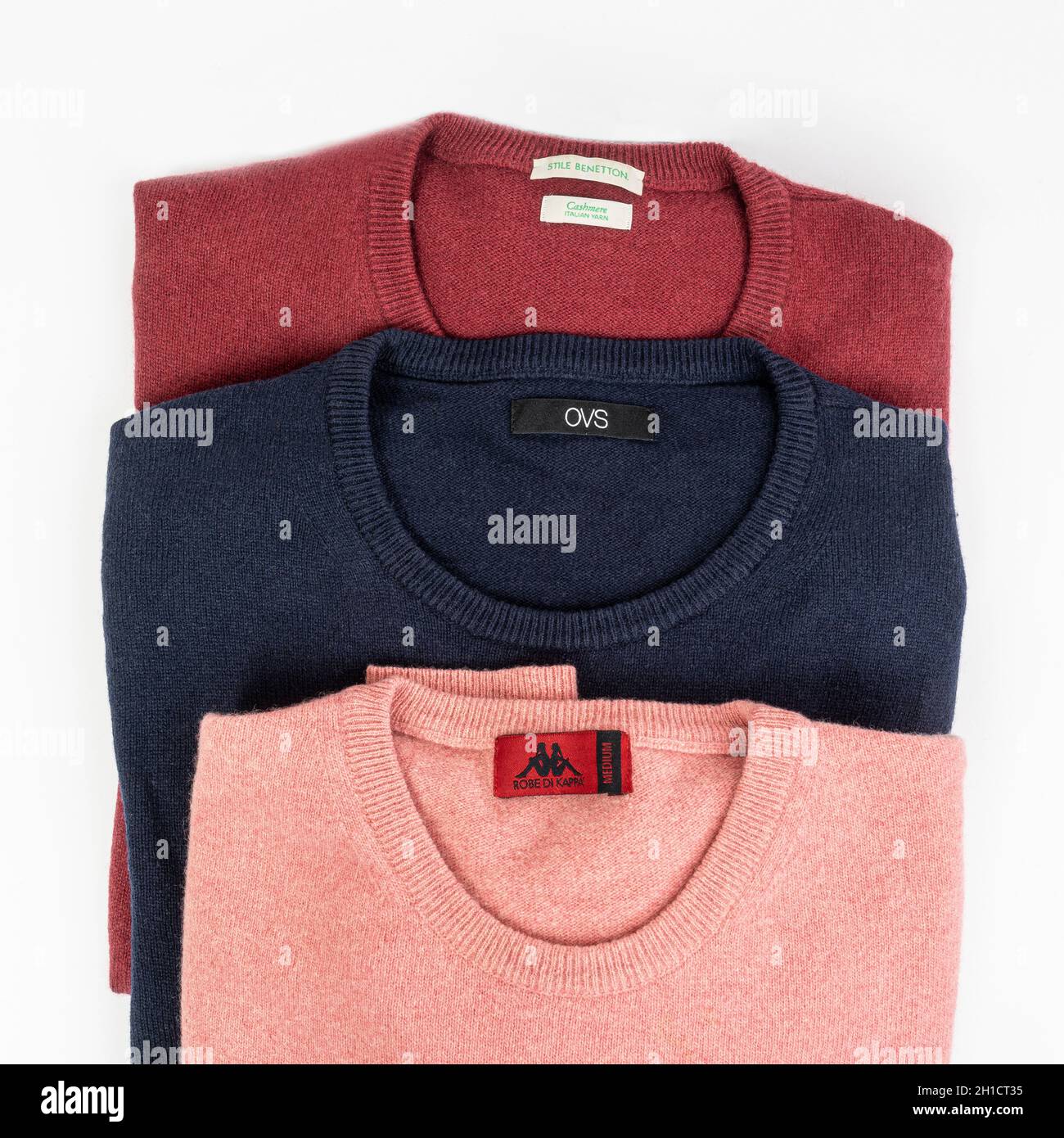 three colored wool shirts of various brands Stock Photo Alamy