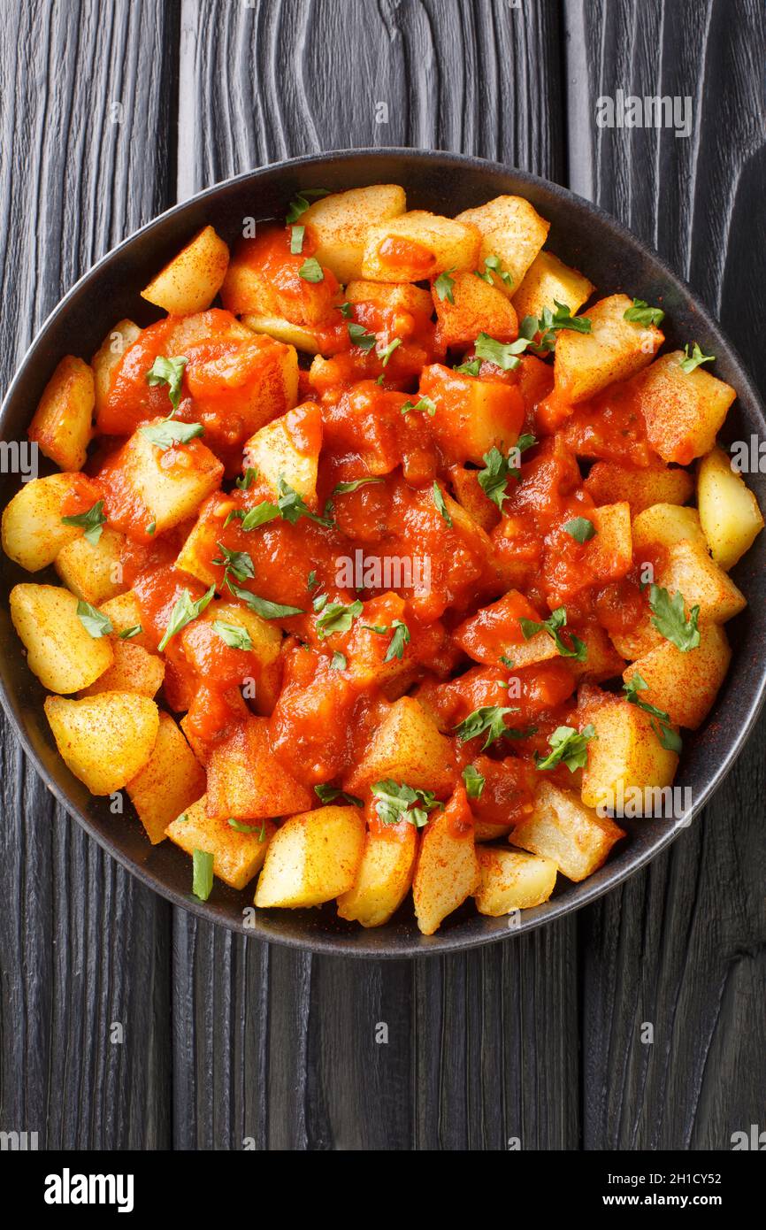 Patatas Bravas is a classic Spanish dish of fried potato cubes served with a spicy dipping sauce
