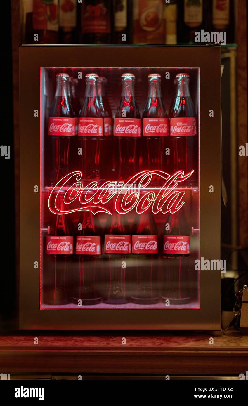 ALPE D'HUEZ, FRANCE - CIRCA 2020: Bottles of Coca Cola soft frink in a  small branded, illuminated fridge, night bar mood Stock Photo - Alamy