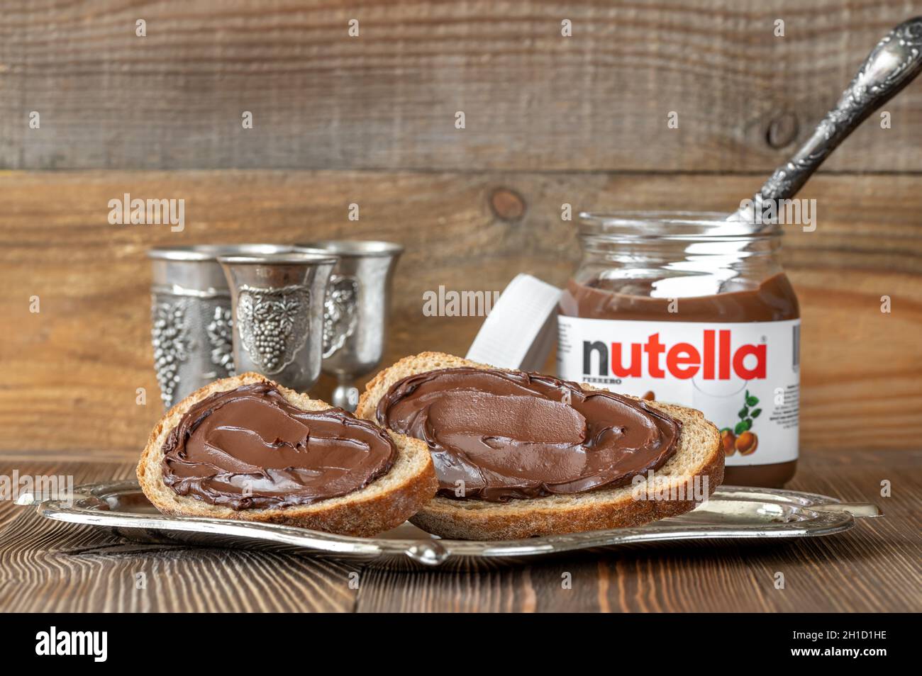 SUMY, UKRAINE - MARCH 12, 2020:  Slices of bread with nutella- world famous Italian hazelnut cocoa spread Stock Photo