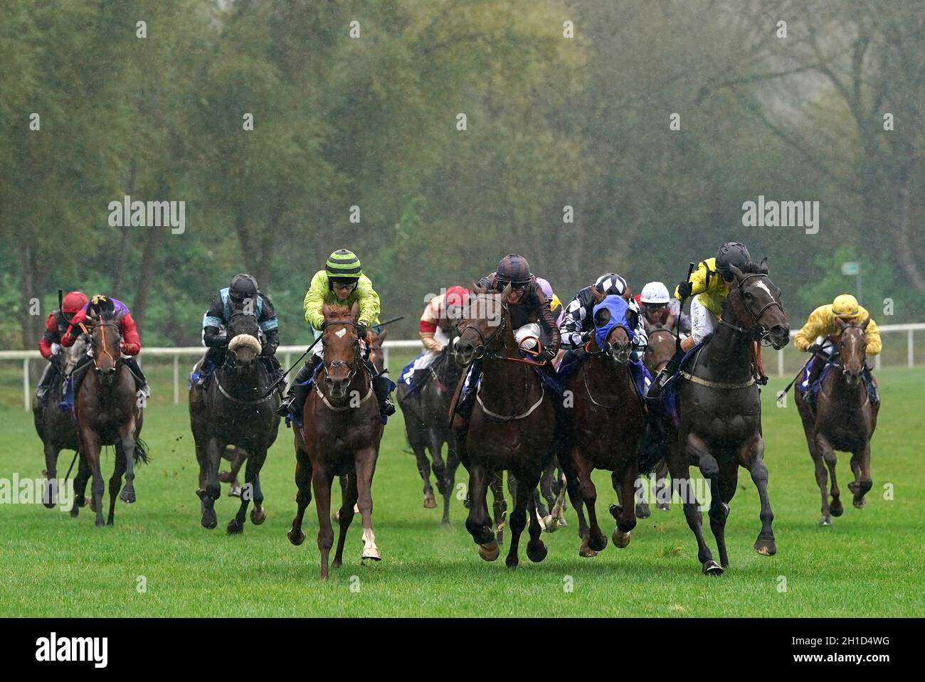 Reelemin ridden by jockey Jason Hart (four left) on their way to ...