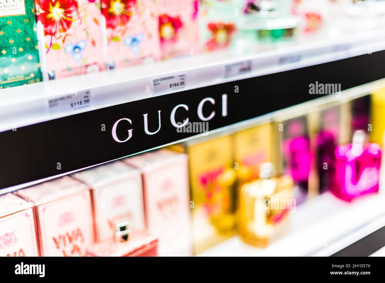 SINGAPORE - MAR 5, 2020: Bottles of perfume by Gucci on a store shelf Stock Photo