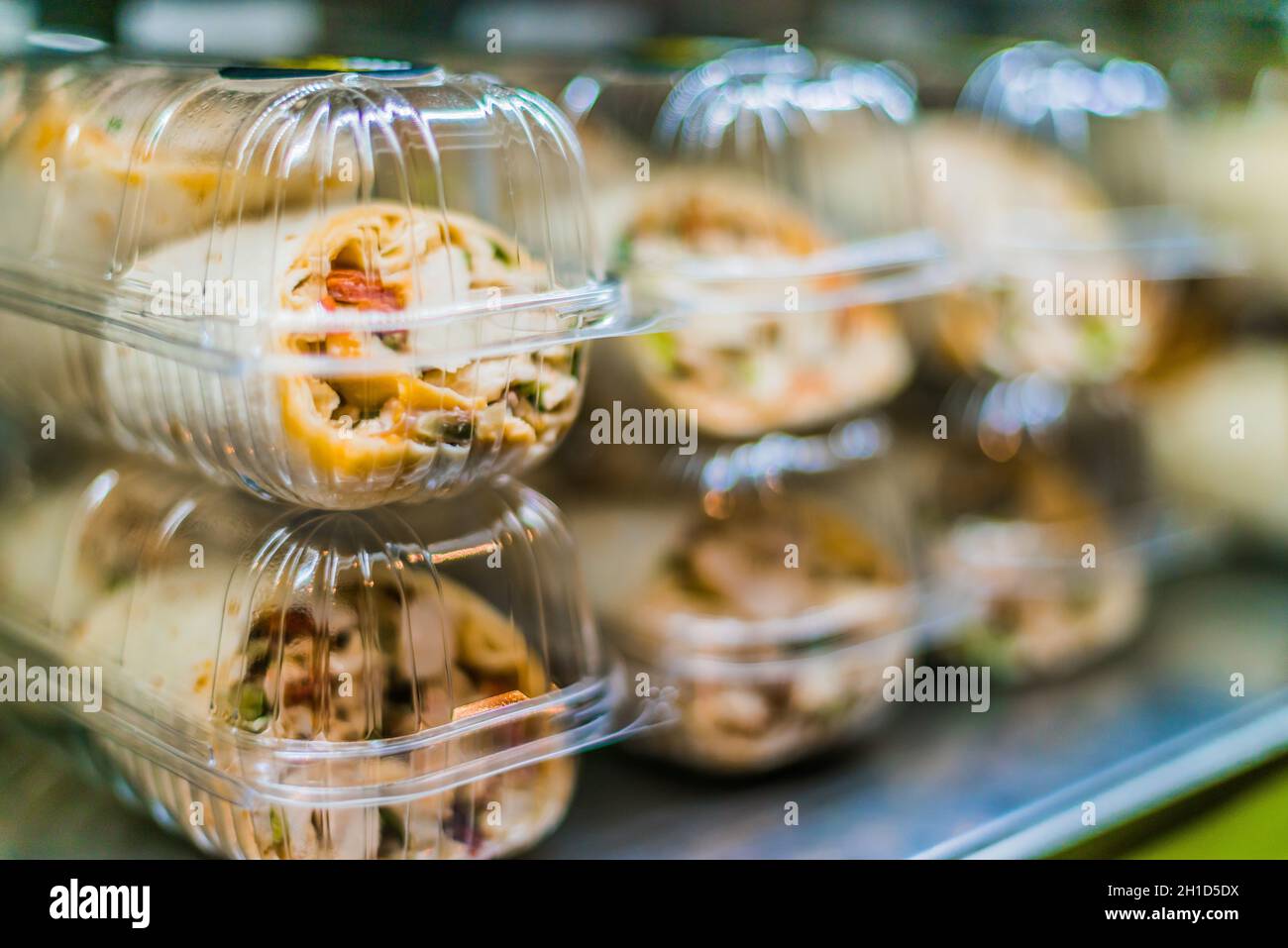 Prepackaged sandwiches displayed in a commercial refrigerator Stock