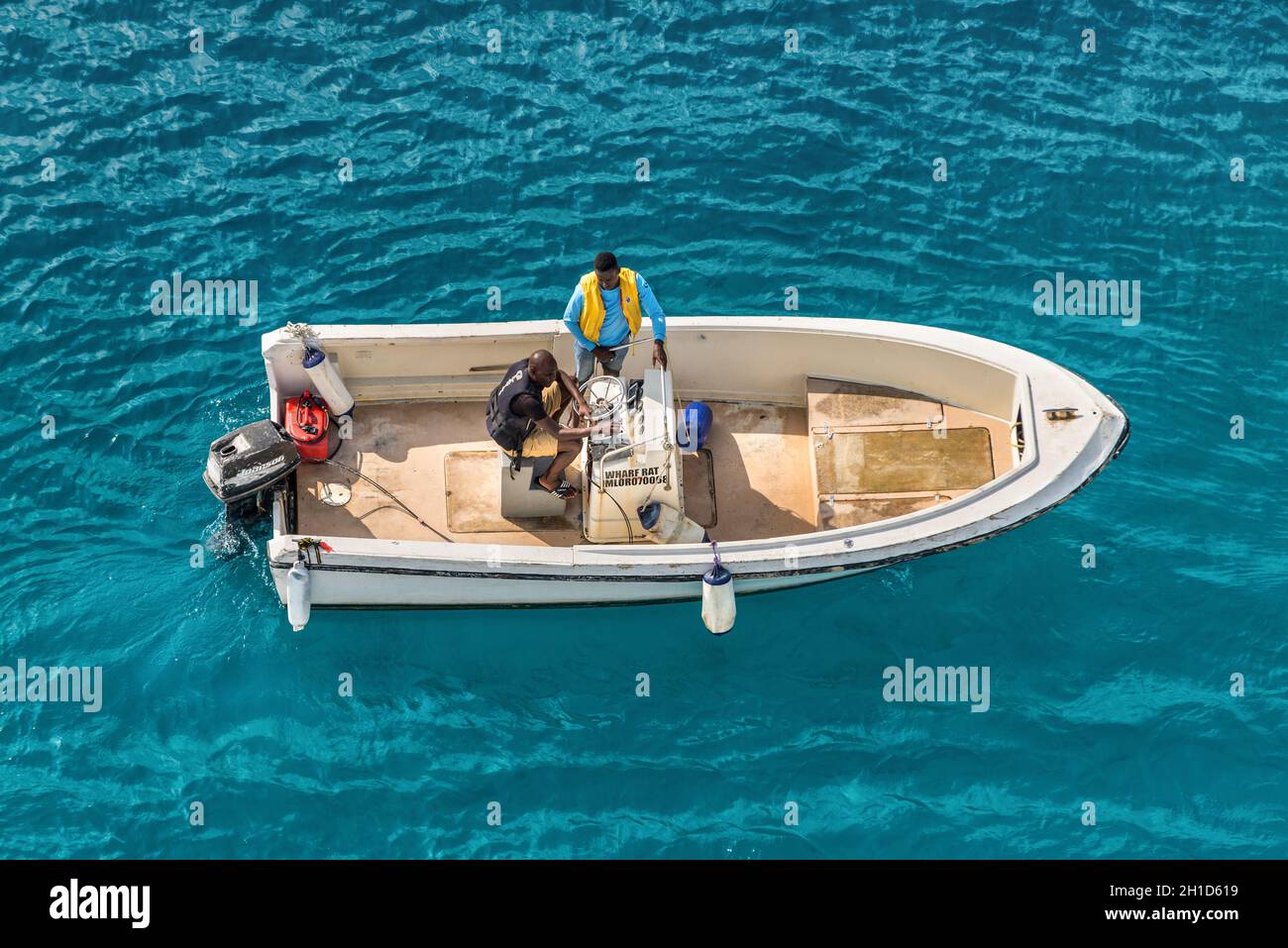 Ocho Rios, Jamaica - April 22, 2019: Top-down view of a motor boat in the ocean near the tropical Caribbean island of Ocho Rios, Jamaica. Stock Photo
