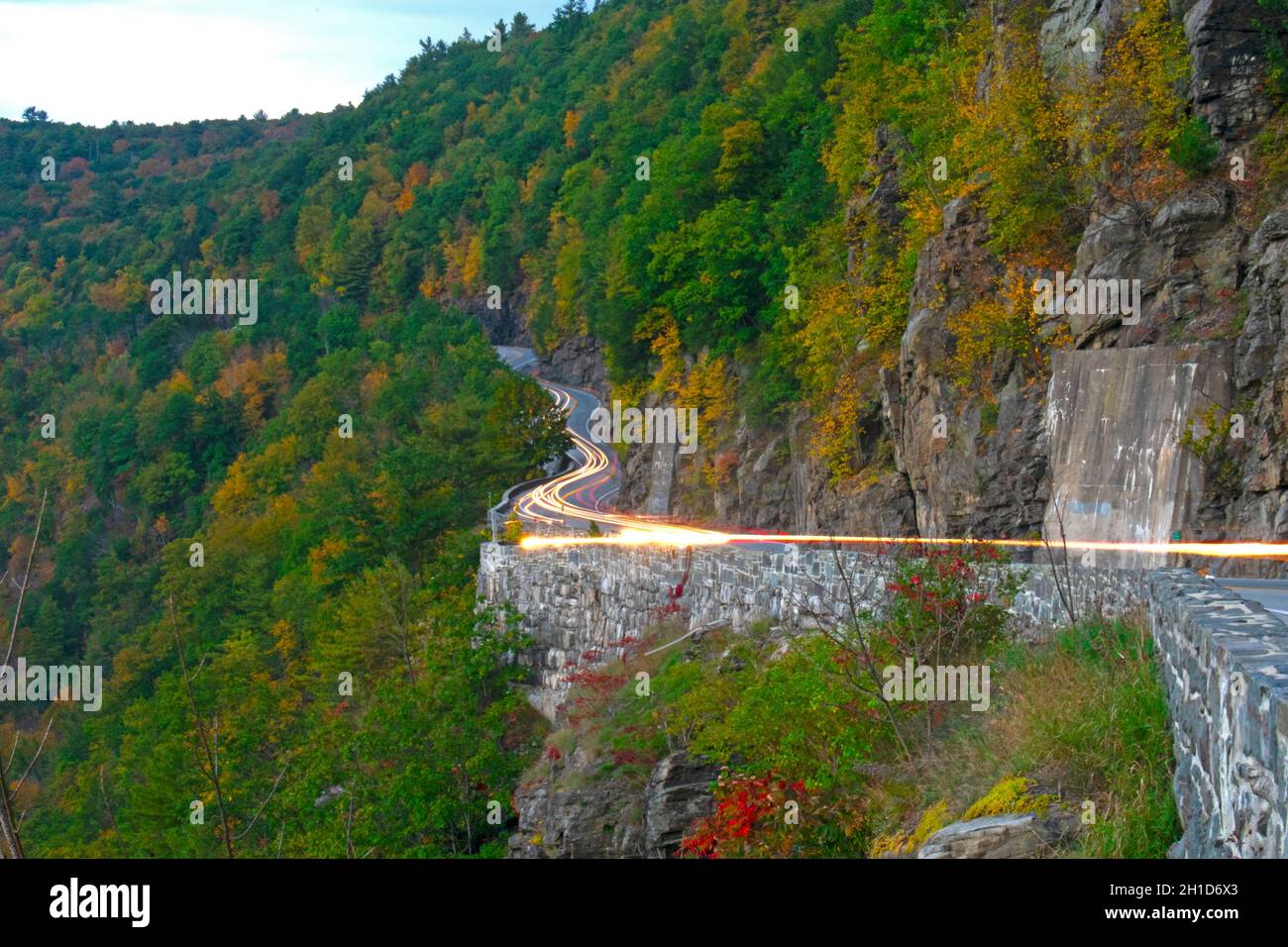 Light trails and colorful fall foliage in early evening at Hawk's Nest