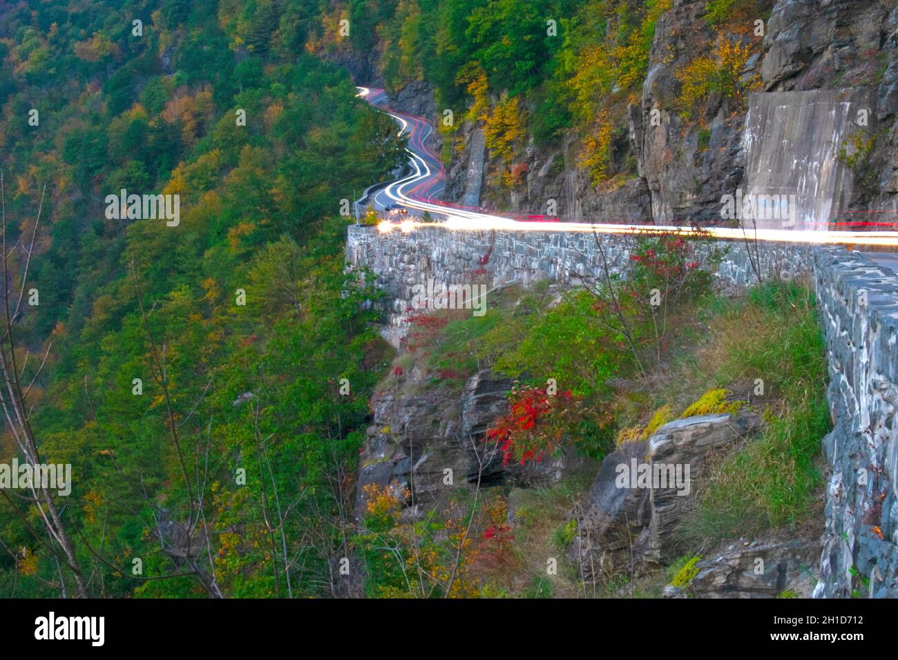 Light trails and colorful fall foliage in early evening at Hawk's Nest