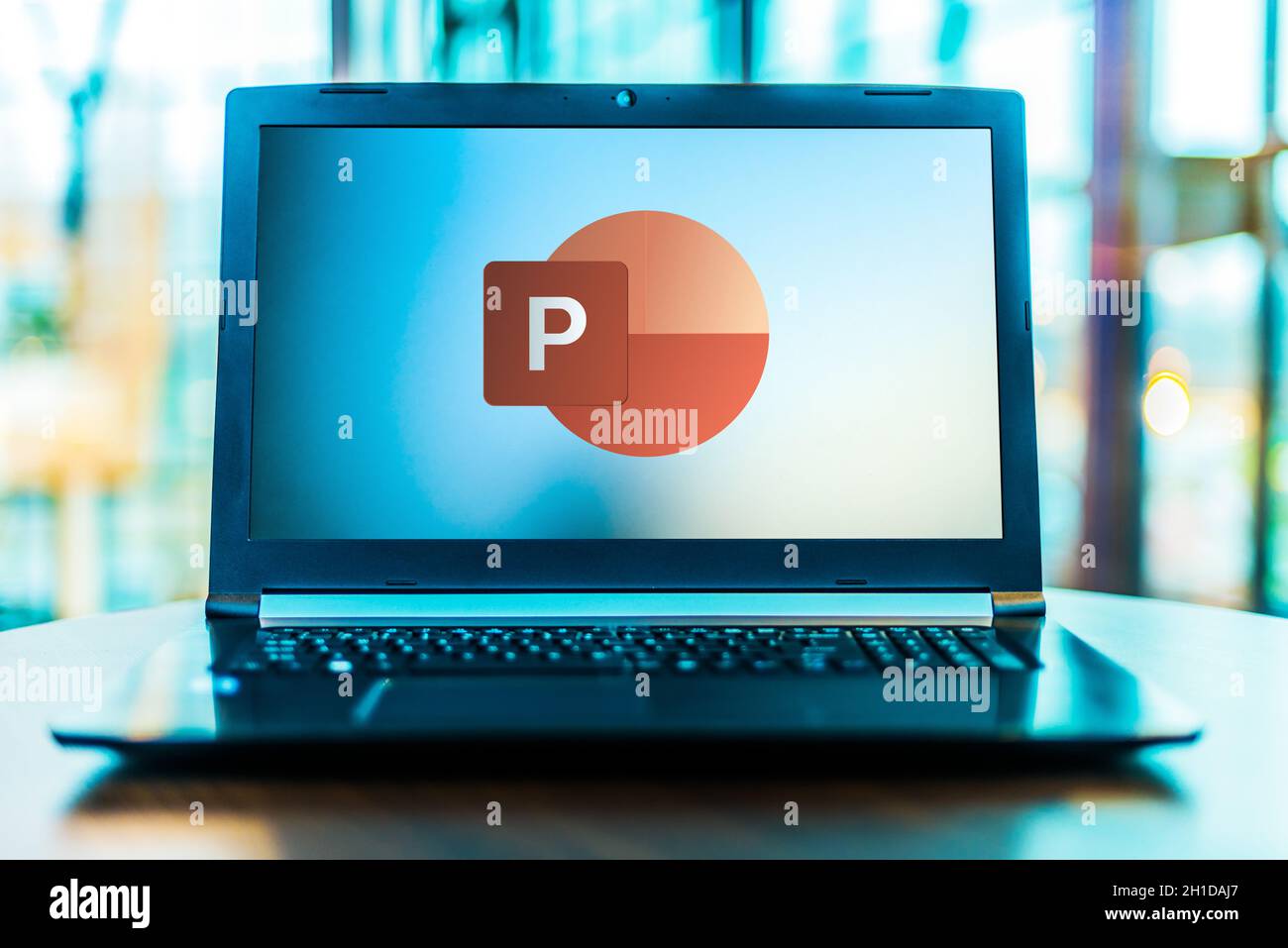 POZNAN, POL - MAR 24, 2020: Laptop computer displaying logo of Microsoft PowerPoint, a presentation program, part of the Office family software and se Stock Photo