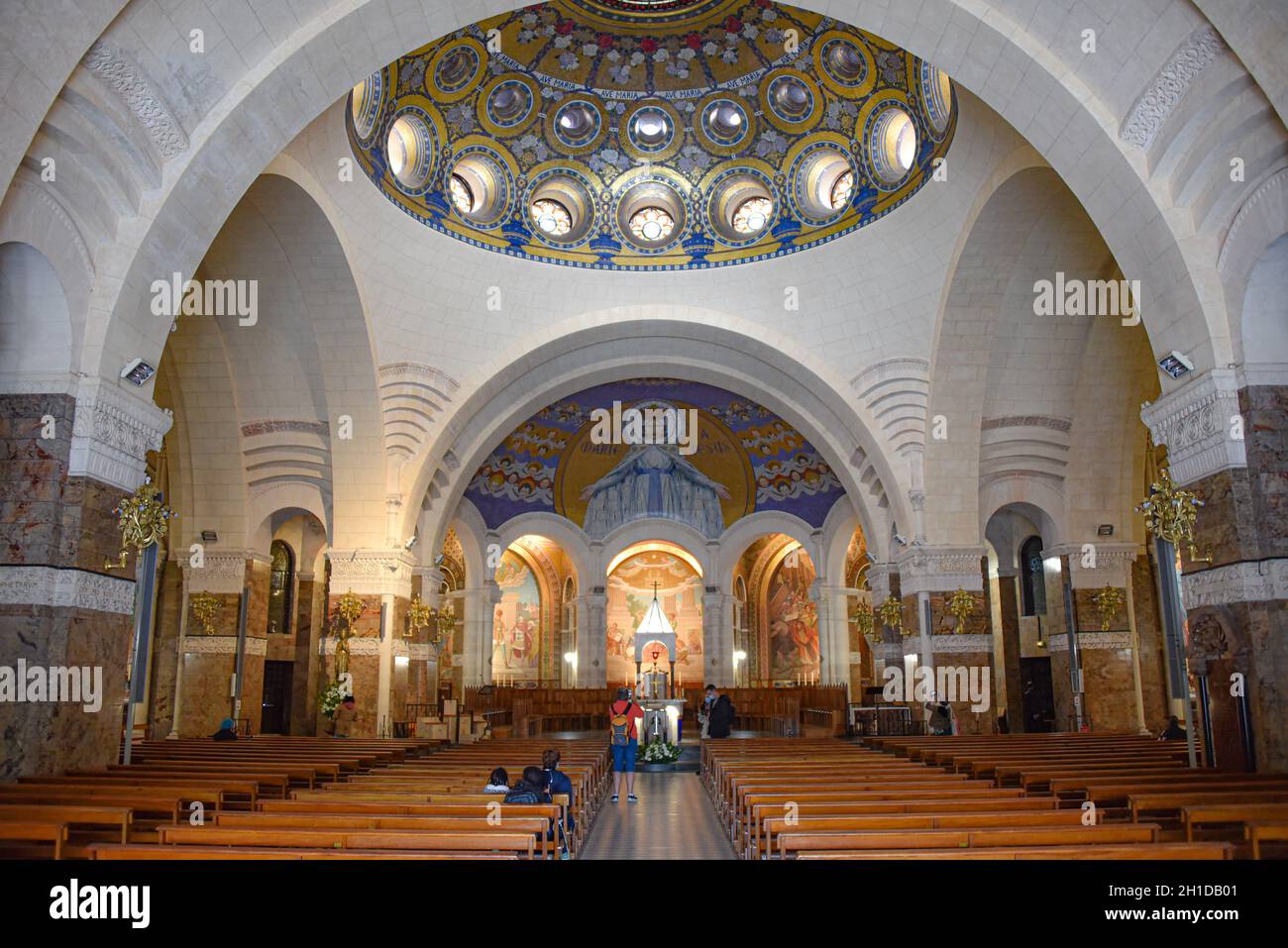 Lourdes, France - 9 Oct, 2021: Interior views of the Basilica Sanctuary of Our Lady of Lourdes Stock Photo