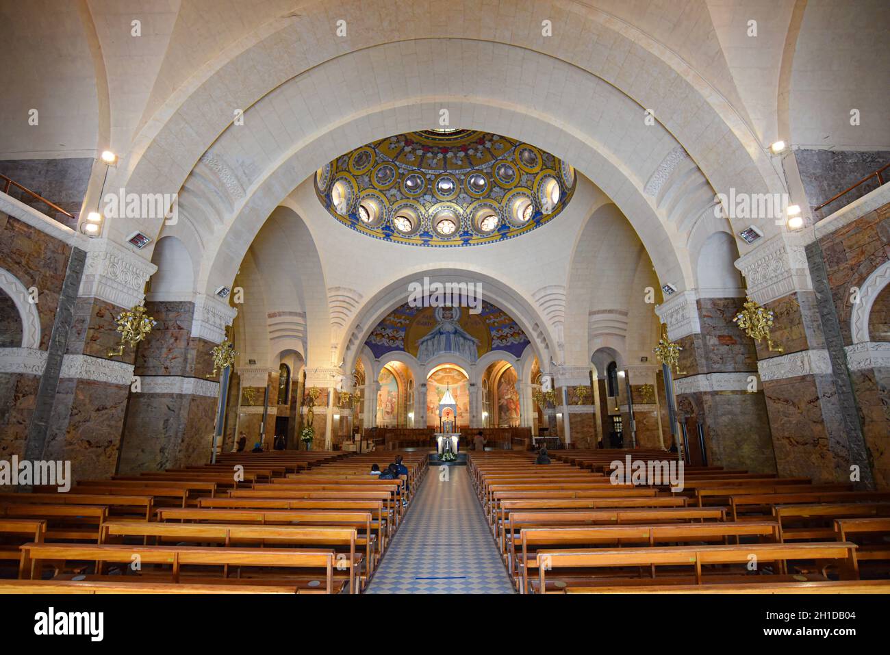 Lourdes, France - 9 Oct, 2021: Interior views of the Basilica Sanctuary of Our Lady of Lourdes Stock Photo
