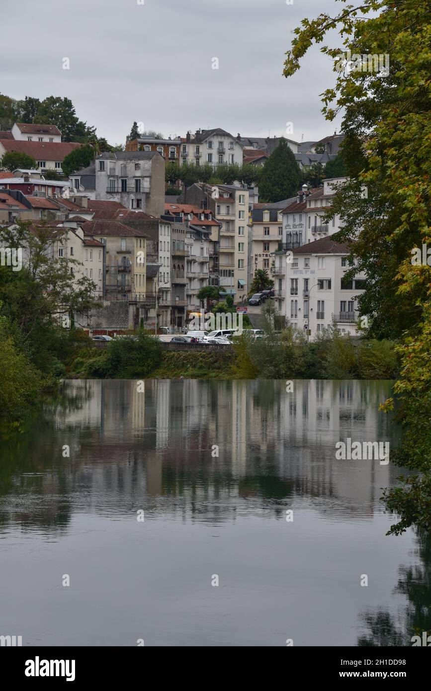 Lourdes, France - 9 Oct 2021: Scenic views along the Gave de Pau river as it flows through the town of Lourdes Stock Photo