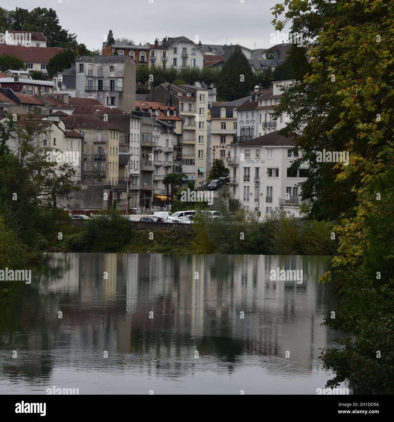 Lourdes, France - 9 Oct 2021: Scenic views along the Gave de Pau river as it flows through the town of Lourdes Stock Photo