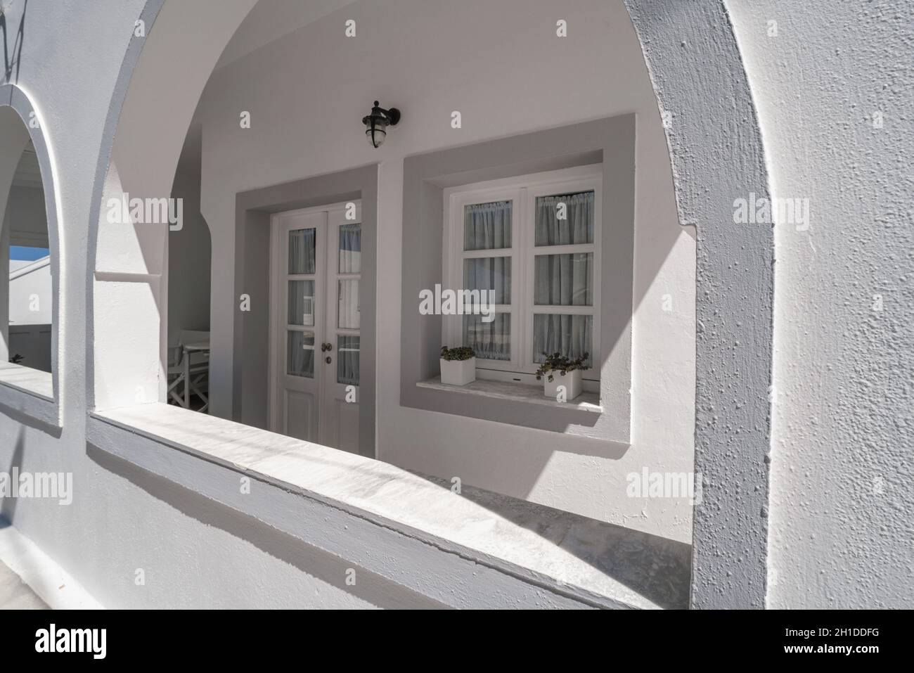 Traditional white buildings and rooftops in the villages of Santorini ...
