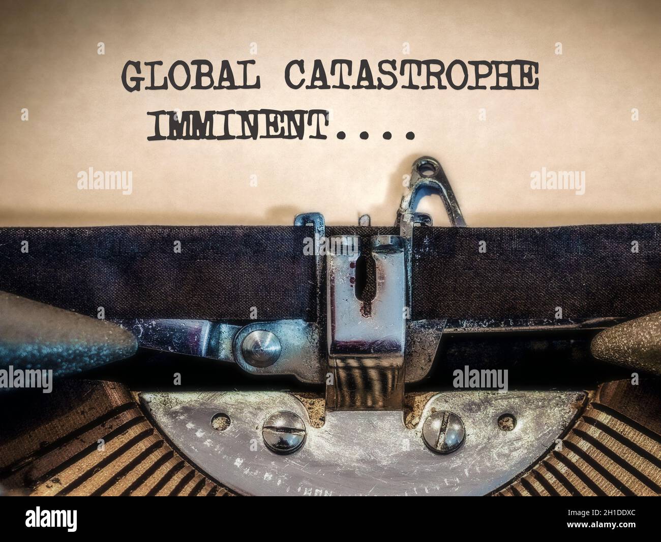 Global catastrophe imminent displayed on a Vintage Typewriter Stock Photo