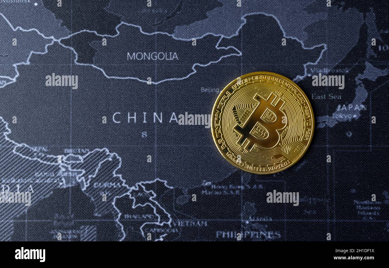golden bitcoin coin on the chinese map background. cryptocurrency concept Stock Photo