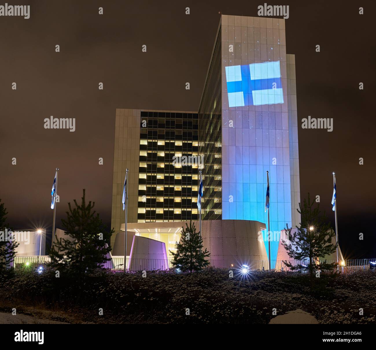Helsinki, Finland - December 6, 2017: The Helsinki University Hospital in Meilahti decorated with blue and white colour lights and Finnish flag as par Stock Photo
