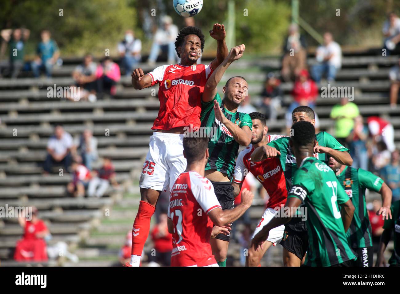 Ayrton Lucas of Flamengo heads the ball against Matias Rojas of