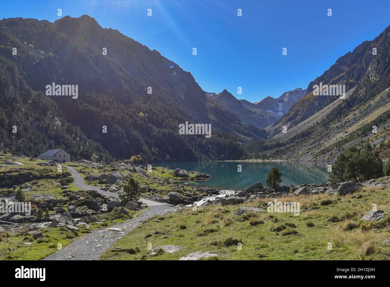 Cauterets, France - 10 Oct 2021: Turquoise waters of the Lac de Gaube in the Pyrenees National Park Stock Photo