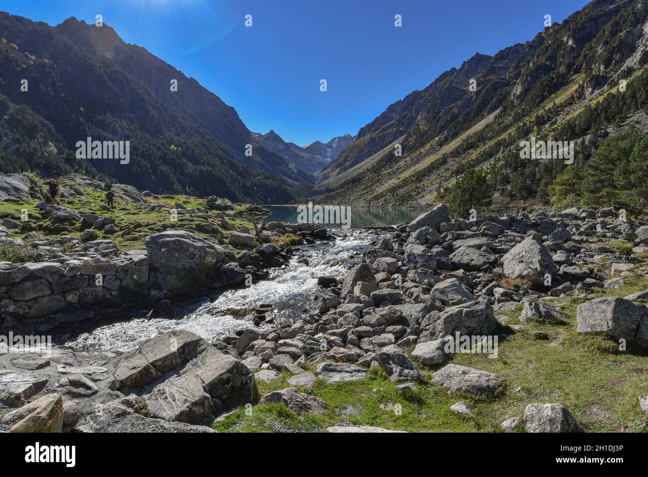 Cauterets, France - 10 Oct 2021: Turquoise waters of the Lac de Gaube in the Pyrenees National Park Stock Photo