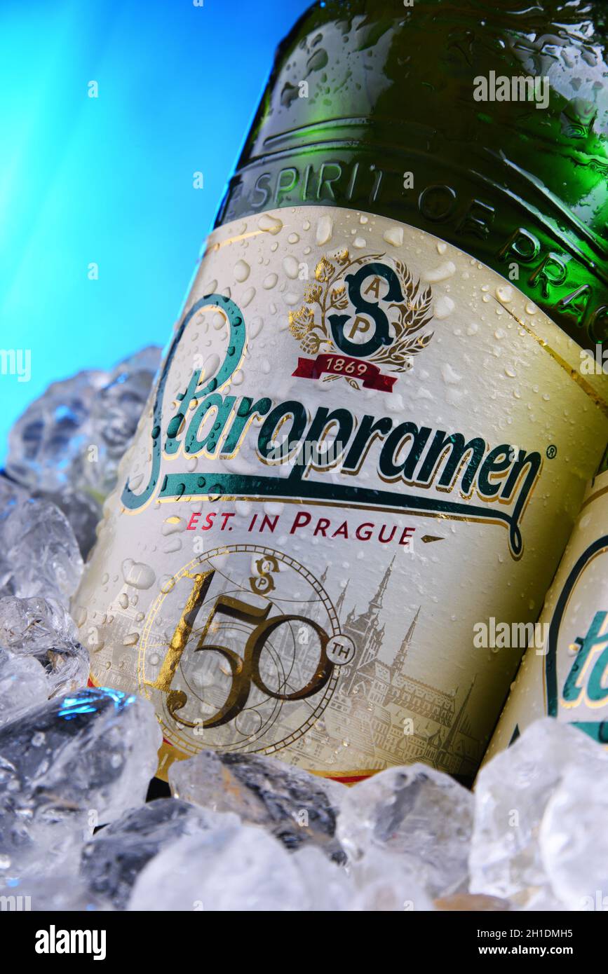 POZNAN, POL - APR 7, 2020: Bottles of Staropramen, the flagship product of Staropramen Brewery. The company owned by Molson Coors and located in Pragu Stock Photo