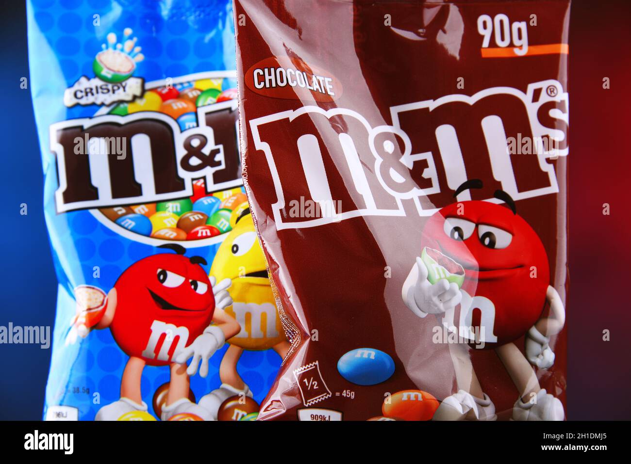 POZNAN, POL - APR 7, 2020: Packages of M&M's, multi-colored button-shaped chocolates produced by Mars, Incorporated Stock Photo