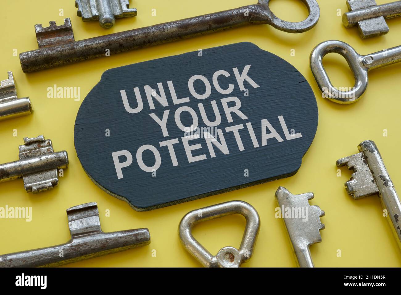Unlock your potential phrase on the plate and keys around Stock Photo(03)