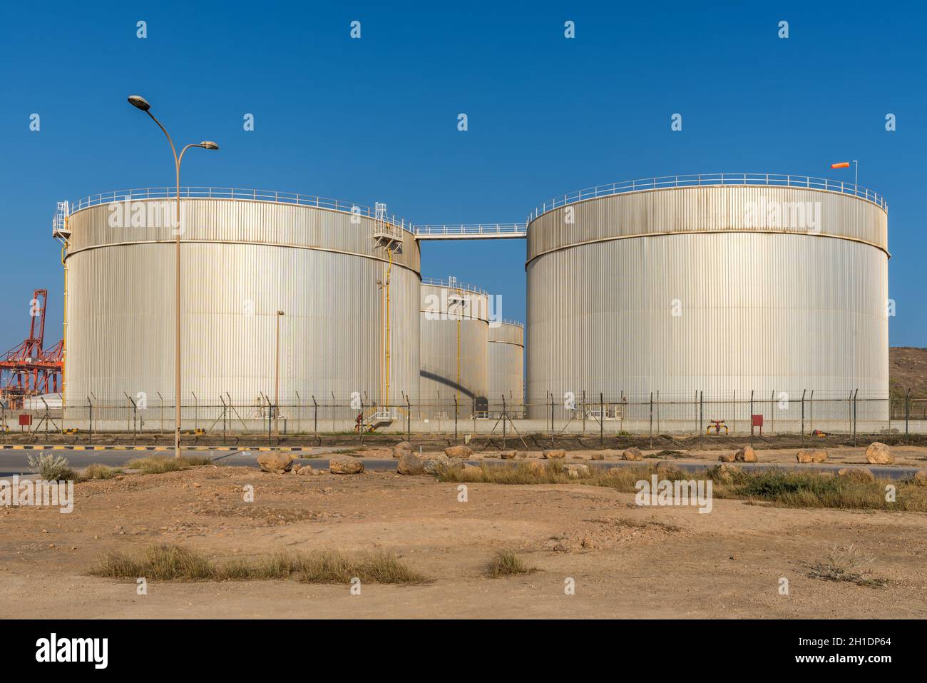 Salalah, Oman - November 12, 2017: Fuel Storage Tanks of the Salalah Fuel Terminal in Oman, Indian Ocean. Stock Photo