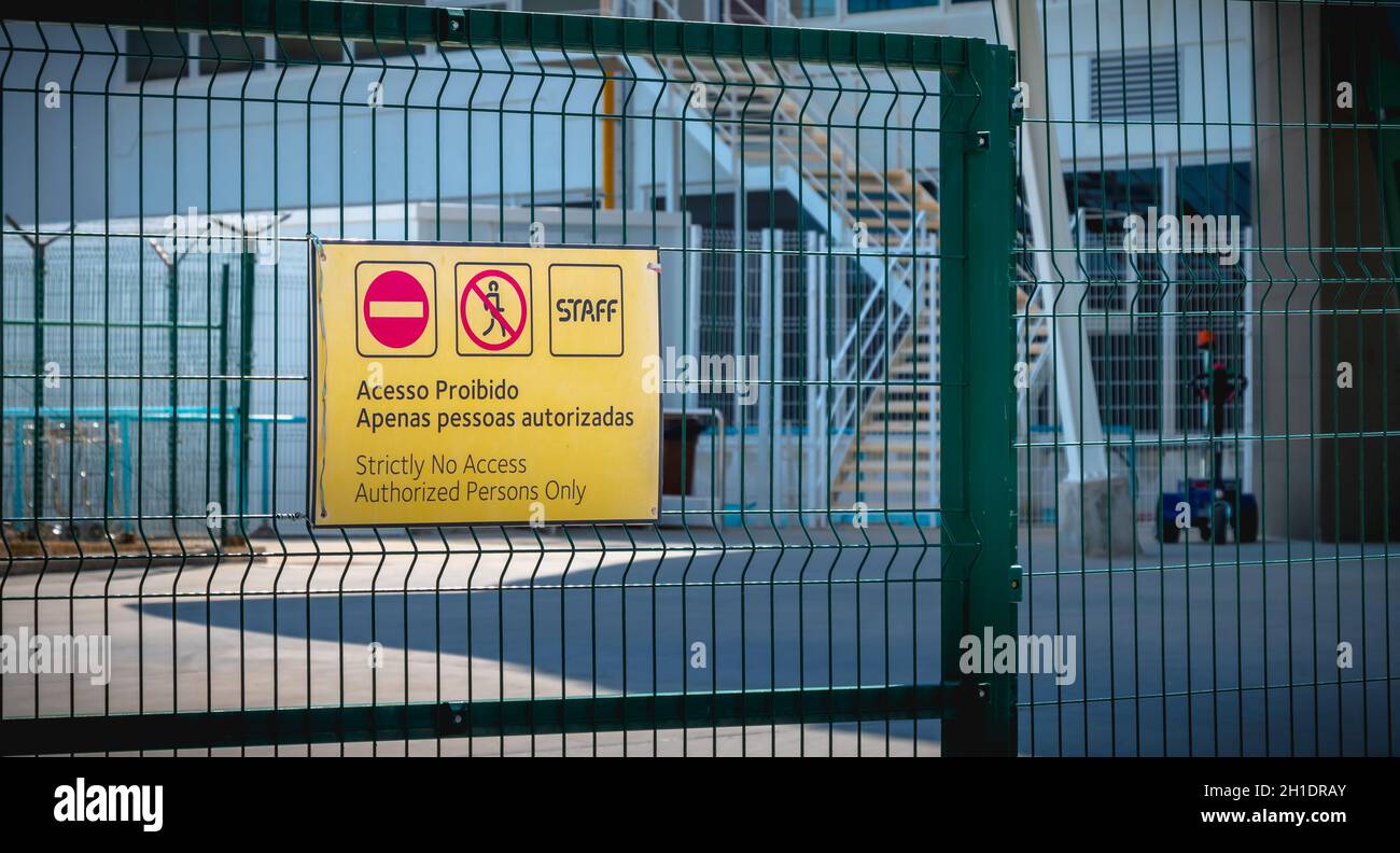 Faro, Portugal - May 3, 2018: Strictly No Access Authorized Persons Only (Acesso Proibido Apenas Pessoas autorizadas) sign in front of Faro Internatio Stock Photo