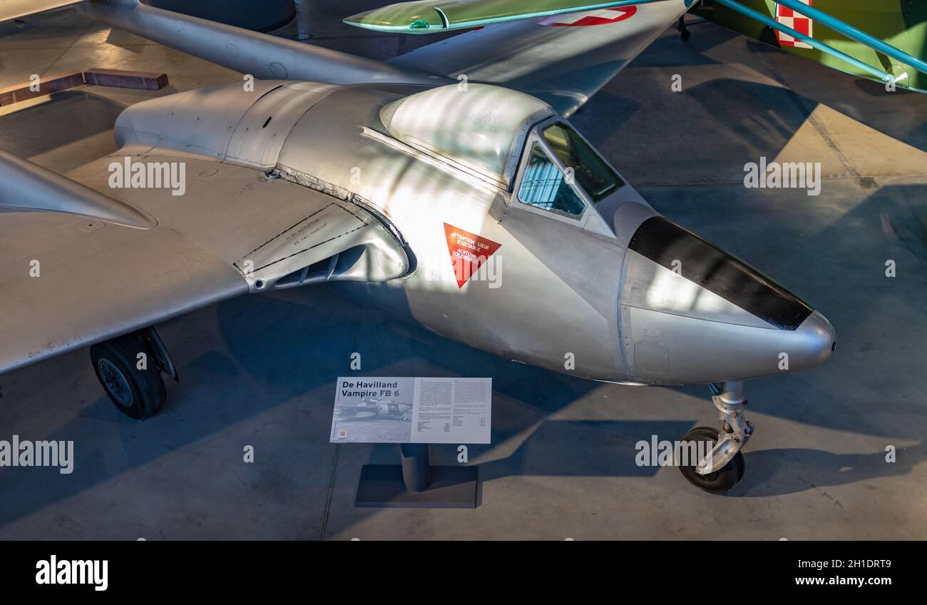 A picture of the De Havilland DH.100 Vampire plane inside the main hangar of the Polish Aviation Museum. Stock Photo