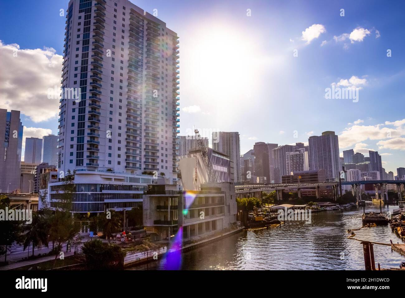 Downtown Miami cityscape view with condos and office buildings against blue sky. Stock Photo