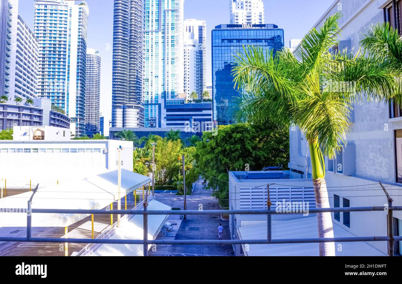 Miami, USA - November 30, 2019: Downtown Miami cityscape view with condos and office buildings against blue sky. Stock Photo