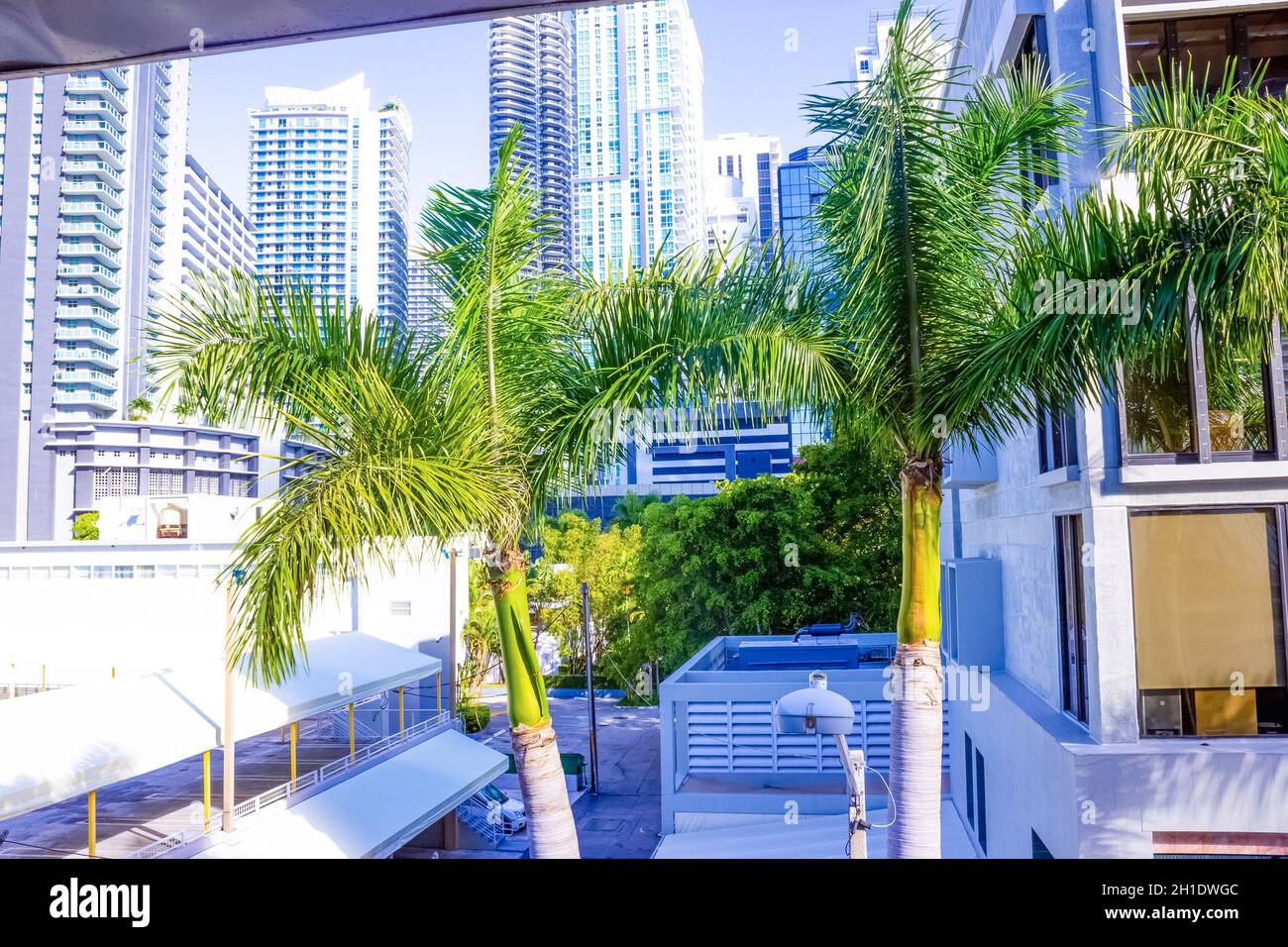 Miami, USA - November 30, 2019: Downtown Miami cityscape view with condos and office buildings against blue sky. Stock Photo