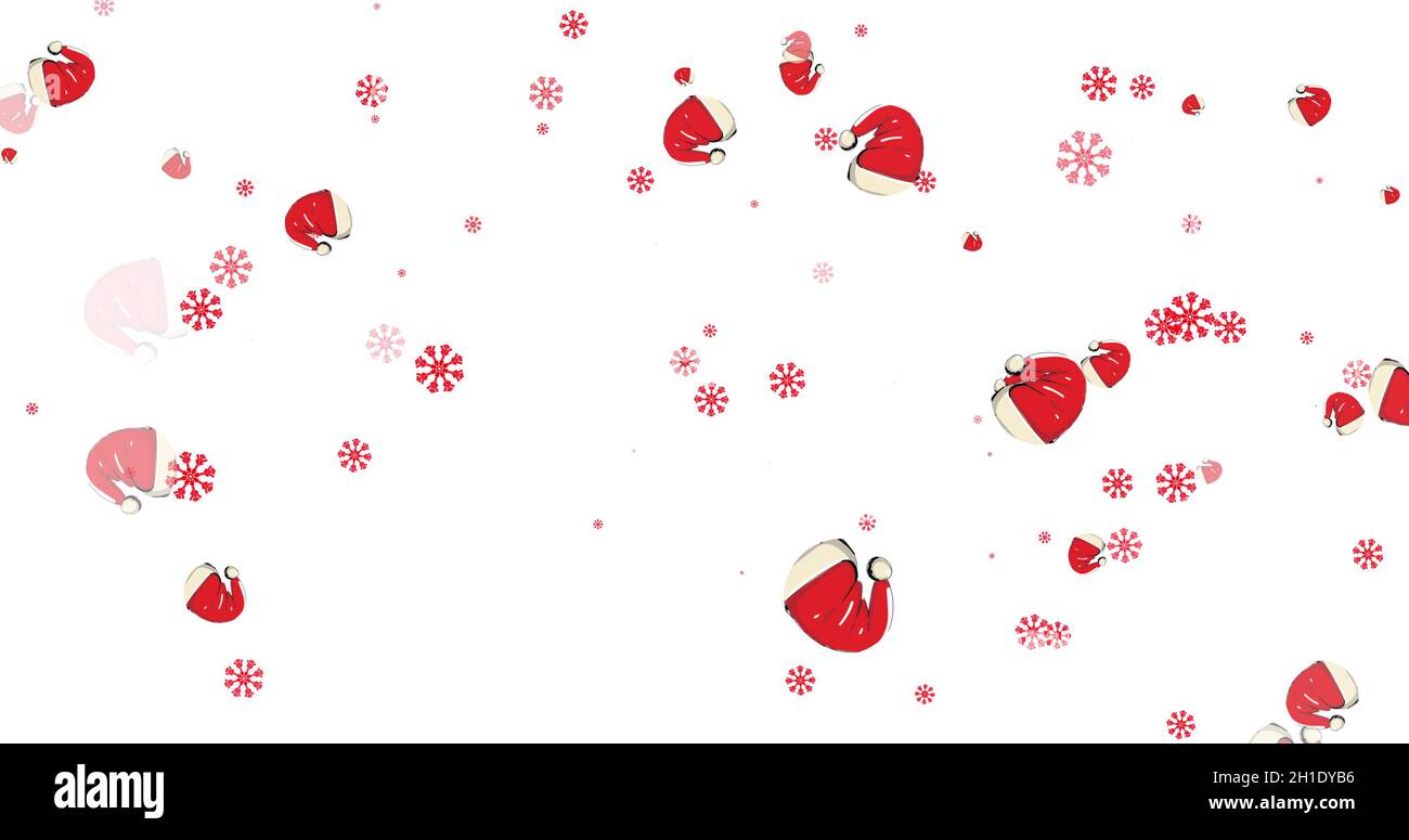 Multiple Santa hats and red snowflakes falling against white background Stock Photo