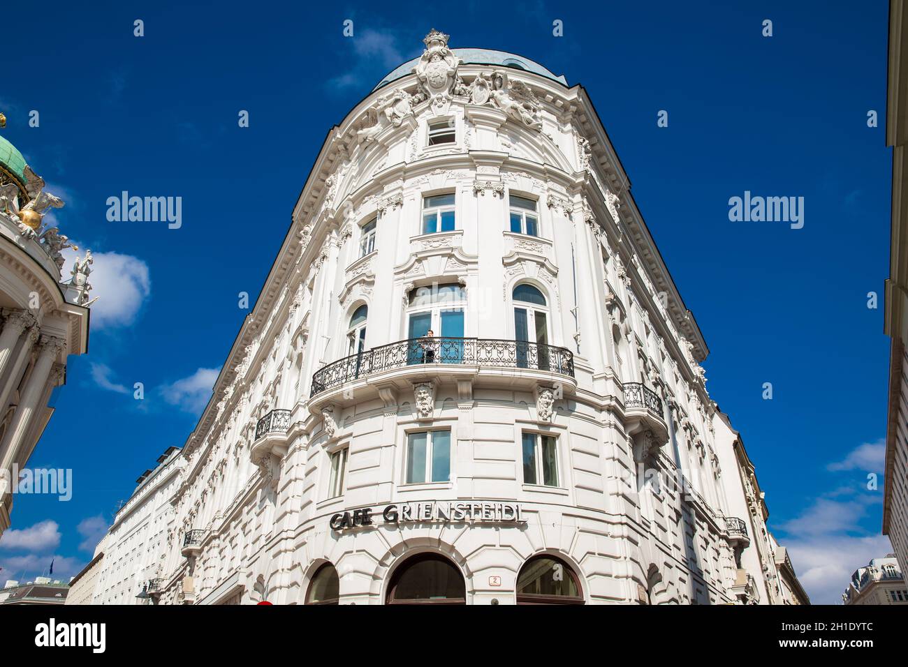 VIENNA, AUSTRIA - APRIL, 2018: Beautiful architecture of the antique buildings at Michaelerplatz next to the Hofburg at Vienna inner city Stock Photo