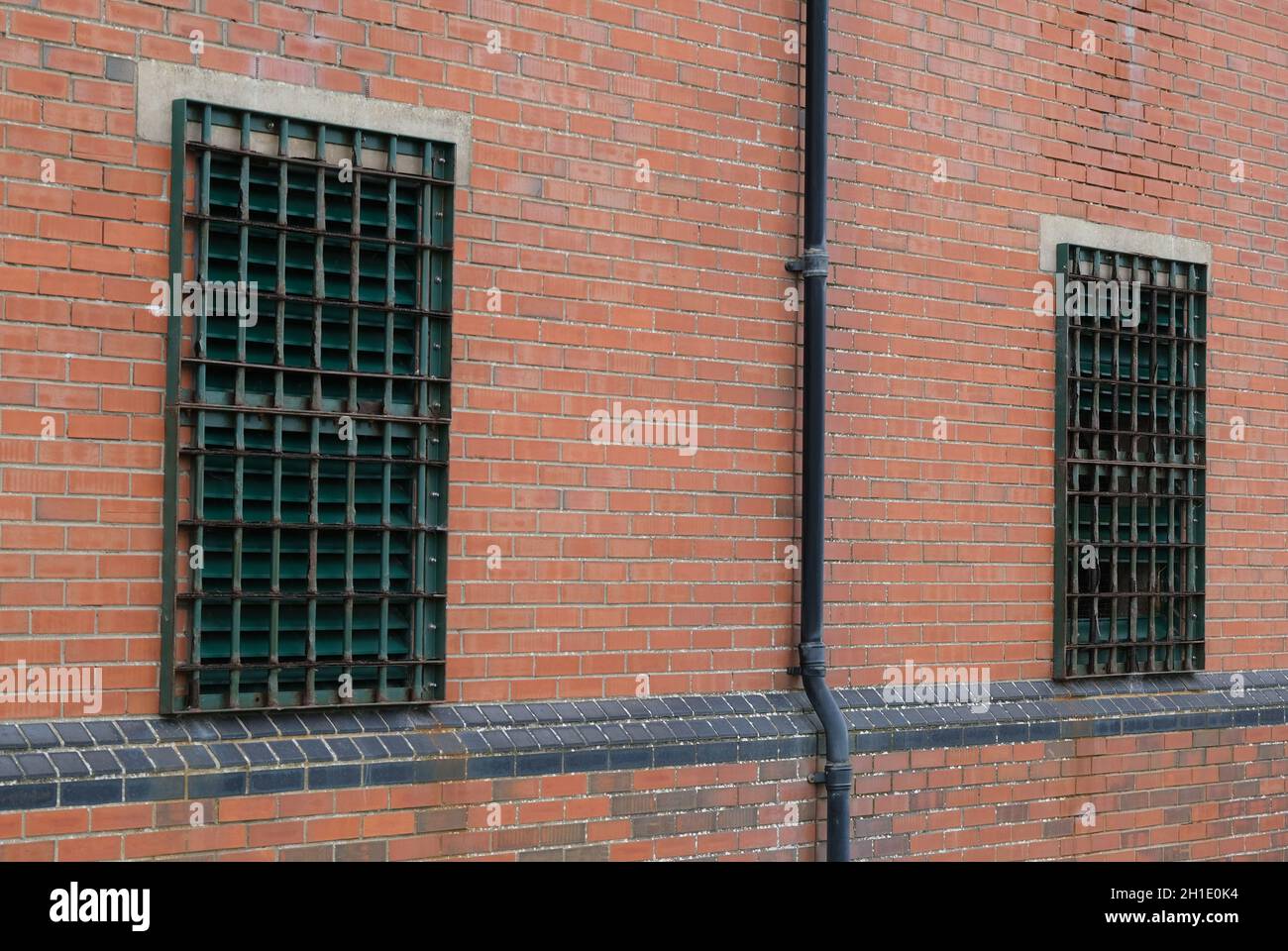 Steel grid bars over building windows to prevent unauthorised access