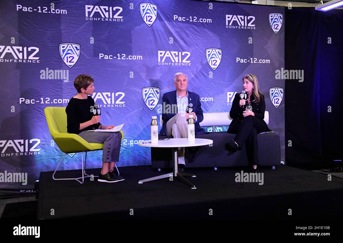 Senior Woman Administrator Teresa Gould responds to Modertaor Ann Schatz, question with the  Commisisioner George Kliavkoff during Pac-12 women's bask Stock Photo