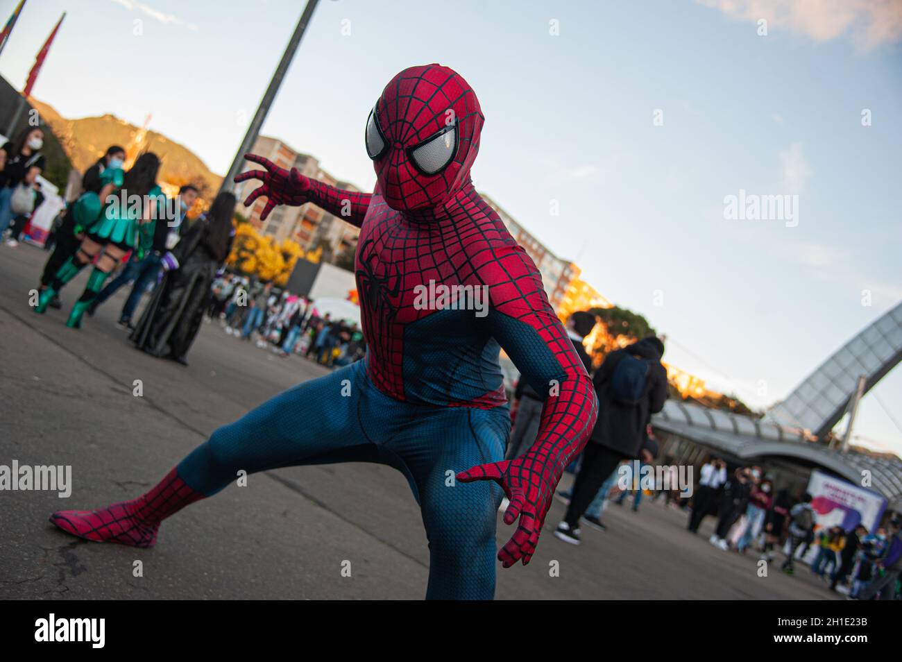 A fan of Marvel superhero Spider Man poses for a photo during the fourth day of the SOFA (Salon del Ocio y la Fantasia) 2021, a fair aimed to the geek Stock Photo