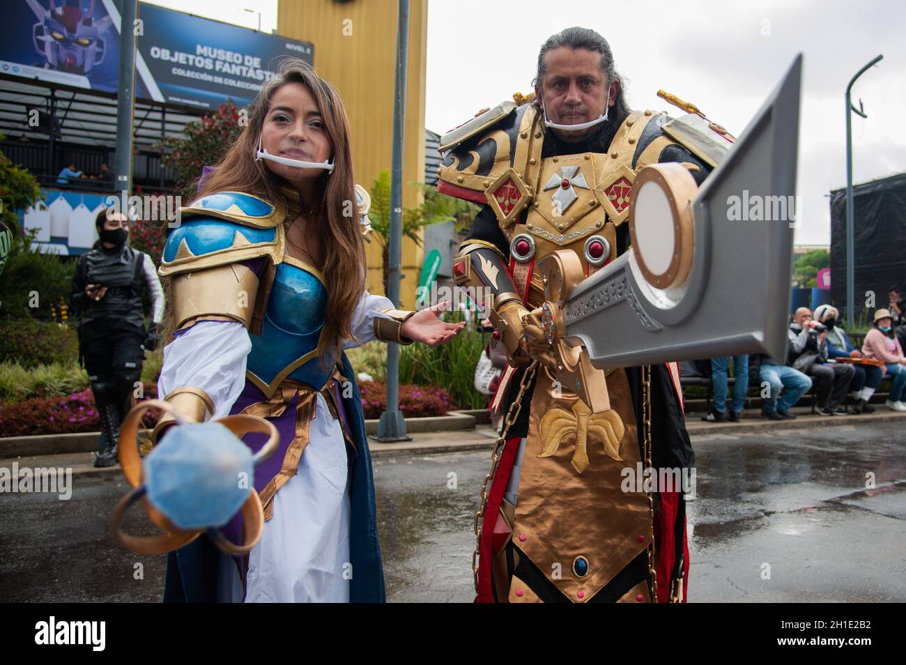 A father and his son cosplay DC character Batman (Left) and Marvel's  Spiderman enemy Doctor Octopus (Right) during the first day of the SOFA  (Salon del Ocio y la Fantasia) 2021, a