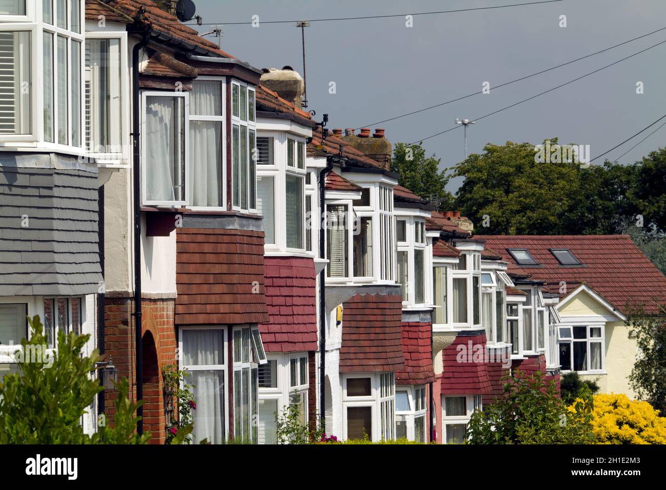 A row of high density suburban terraced houses in South West London. Stock Photo