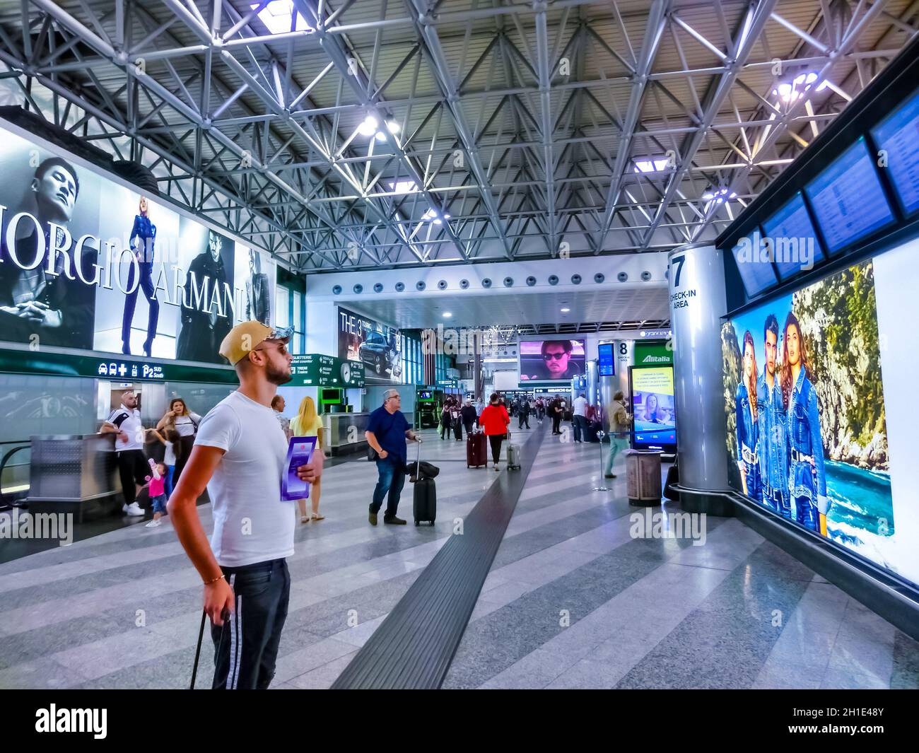 Milan, Italy - September 18, 2019: People in departure area of Milan ...