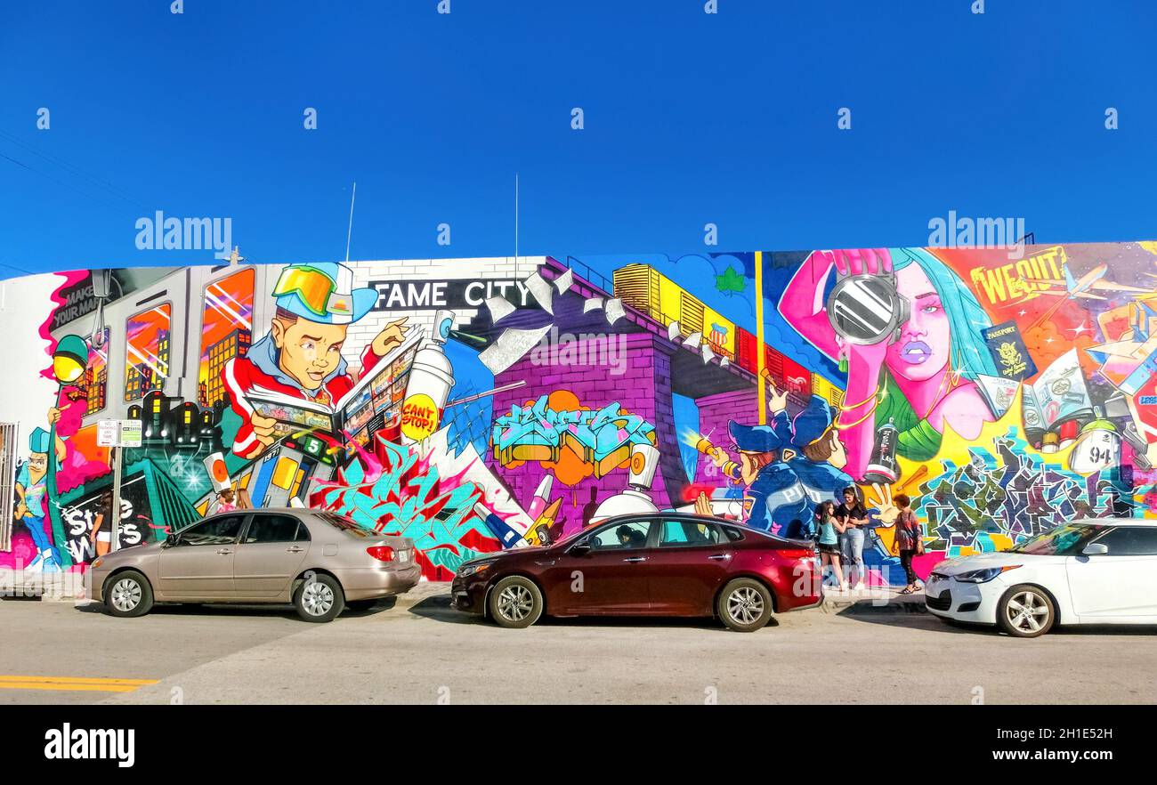Miami, United States of America - November 30, 2019: The street and cars at Art Wynwood in Miami, USA. Wynwood is a neighborhood in Miami Florida whic Stock Photo