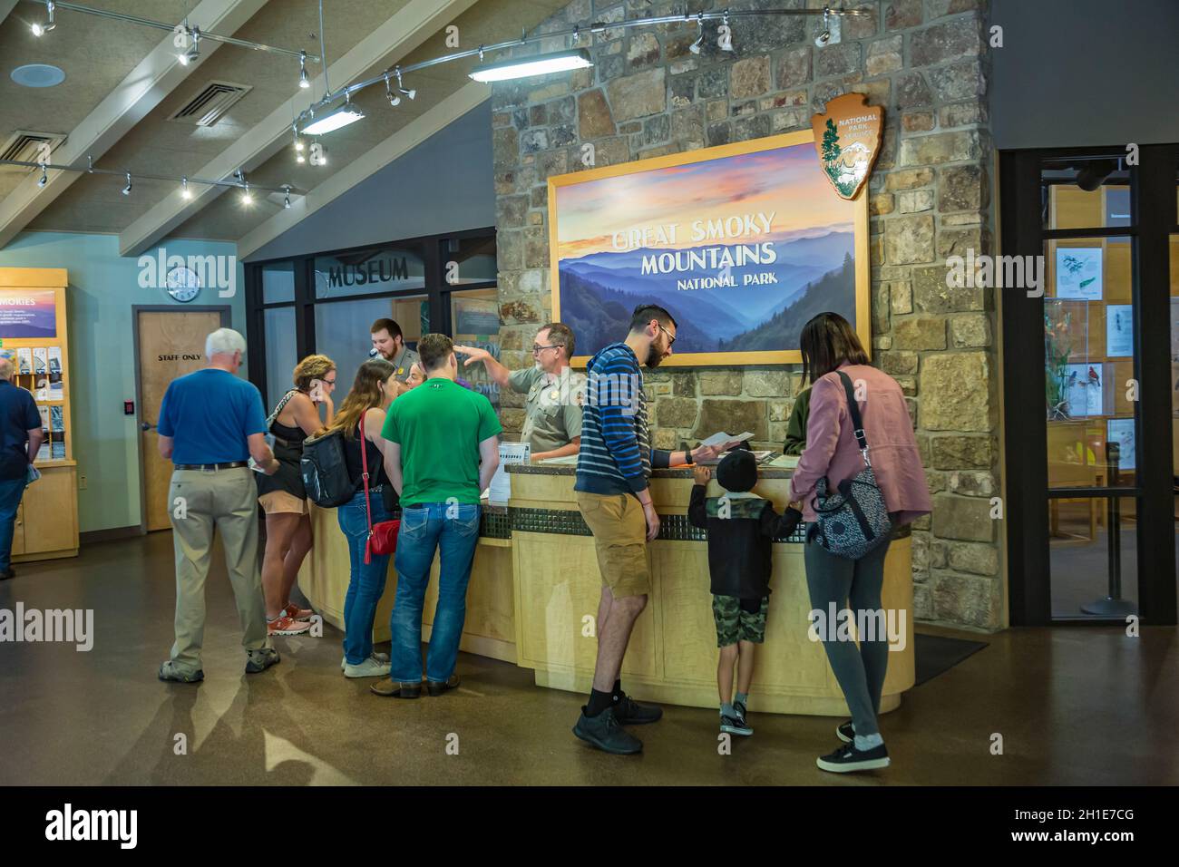 Park Guests getting information from rangers inside the Sugarlands Visitor Center in the Great Smoky Mountains National Park near Gatlinburg, Tennesse Stock Photo