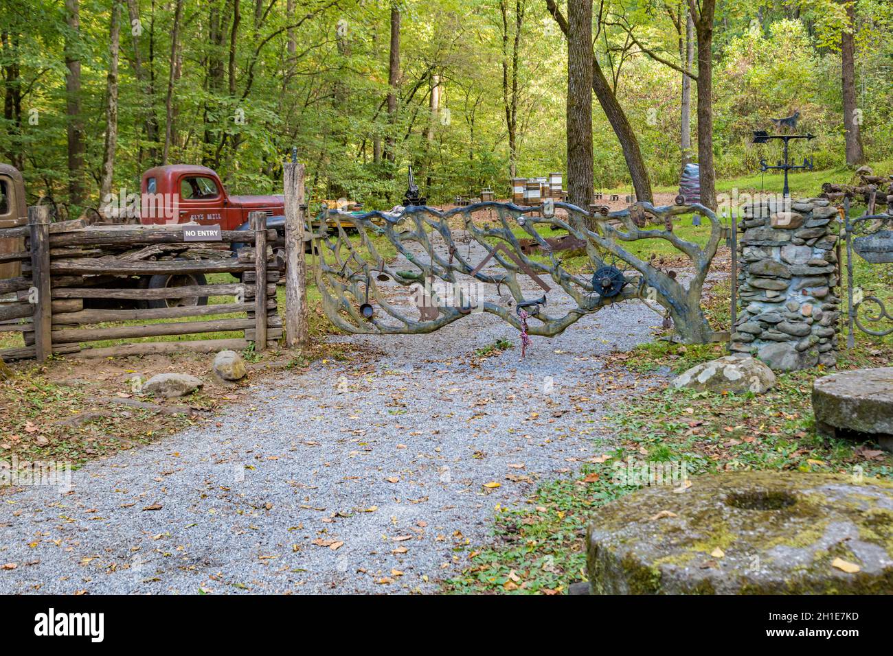 Hand crafted wooden gate looks like tree branches at Ely's Mill along the Roaring Fork Motor Nature Trail outside Gatlinburg Tennessee in the Great Sm Stock Photo