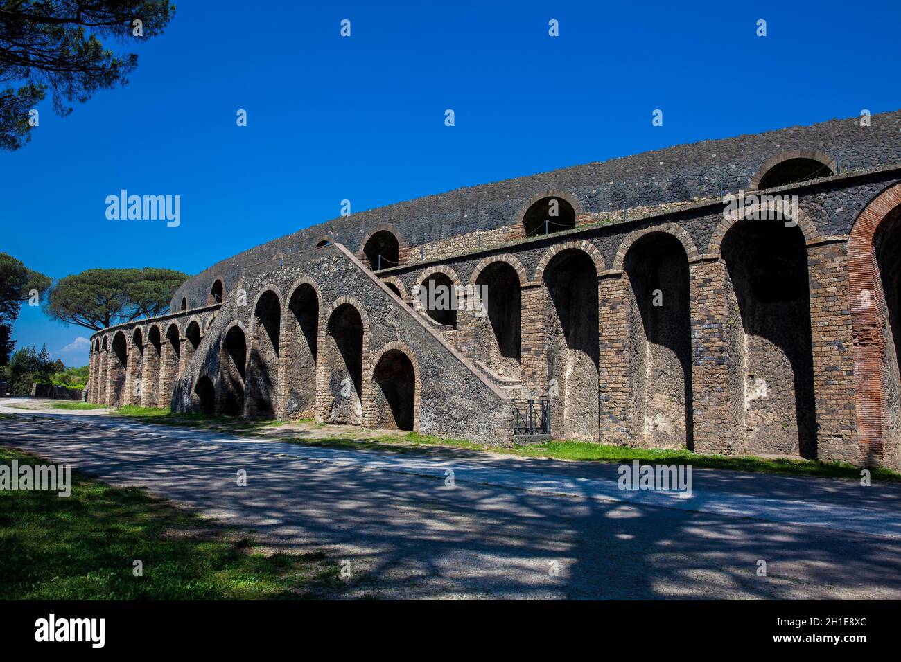 Exterior of the roman Amphitheatre of Pompeiiin a beautiful early ...
