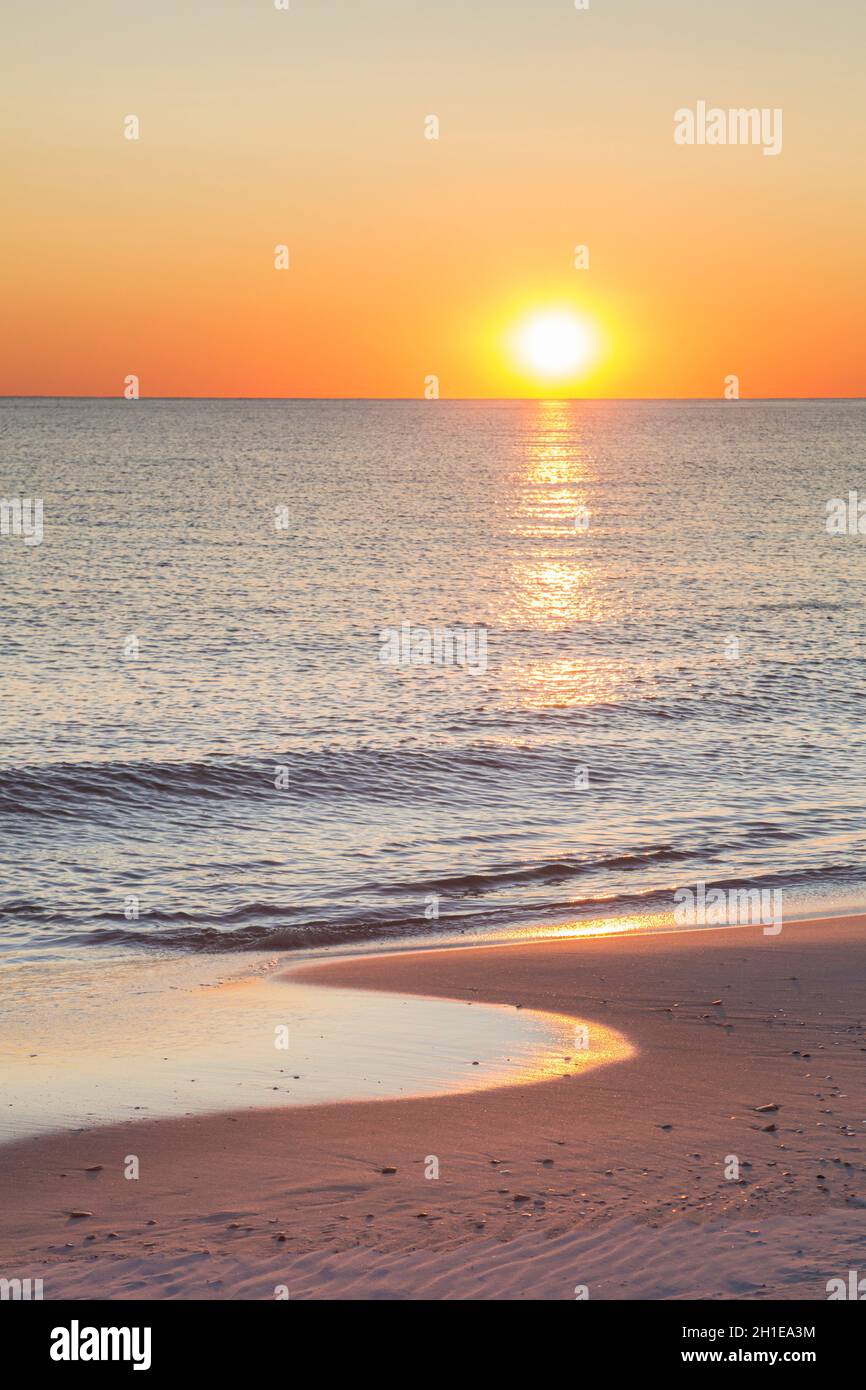Sunset on the beach at Gulf Shores, Alabama Stock Photo