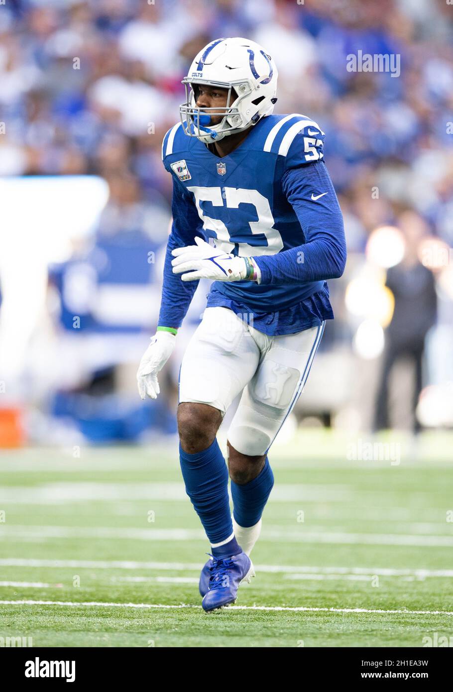 Indianapolis Colts quarterback Andrew Luck (12) scrambles as New York Jets  defensive end Leonard Williams (92) chases him during the first half of an  NFL football game, Sunday, Oct. 14, 2018, in