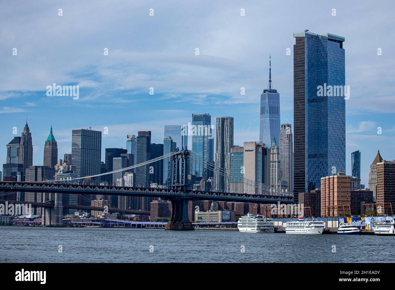 A view of the Manhattan skyline from the East River in New York City ...