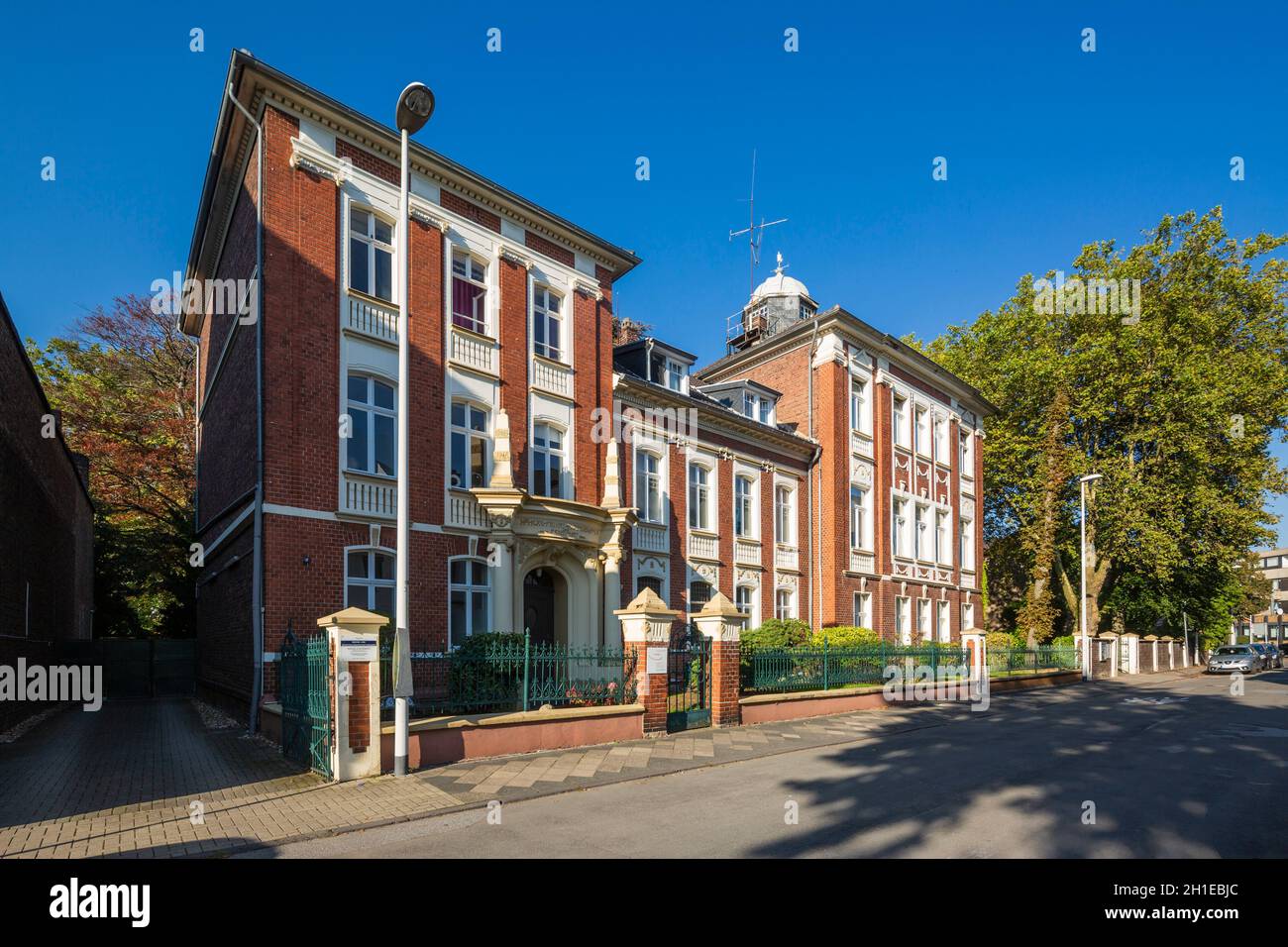 Germany, Hilden, Bergisches Land, Niederbergisches Land, Niederberg, Rhineland, North Rhine-Westphalia, NRW, rectorate school with observatory, boys school, secondary school, collegiate school, public school, boarding school, college, brick building, Empire style Stock Photo