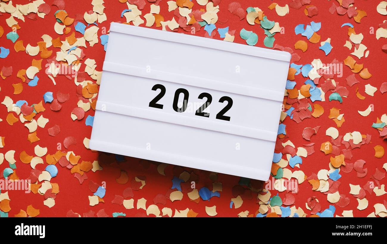 new year 2022 party celebration flat lay with confetti Stock Photo