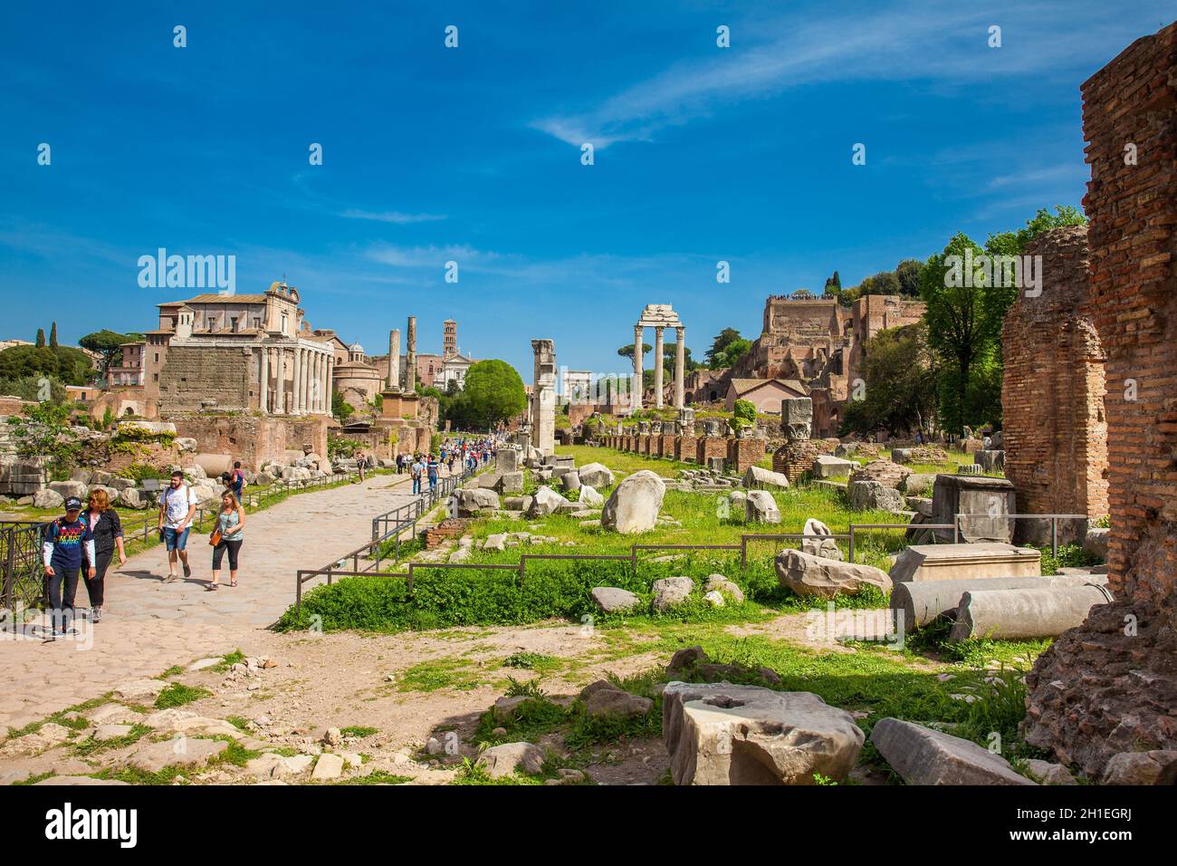 ROME, ITALY - APRIL, 2018: Tourists visiting the Roman Forum in a ...